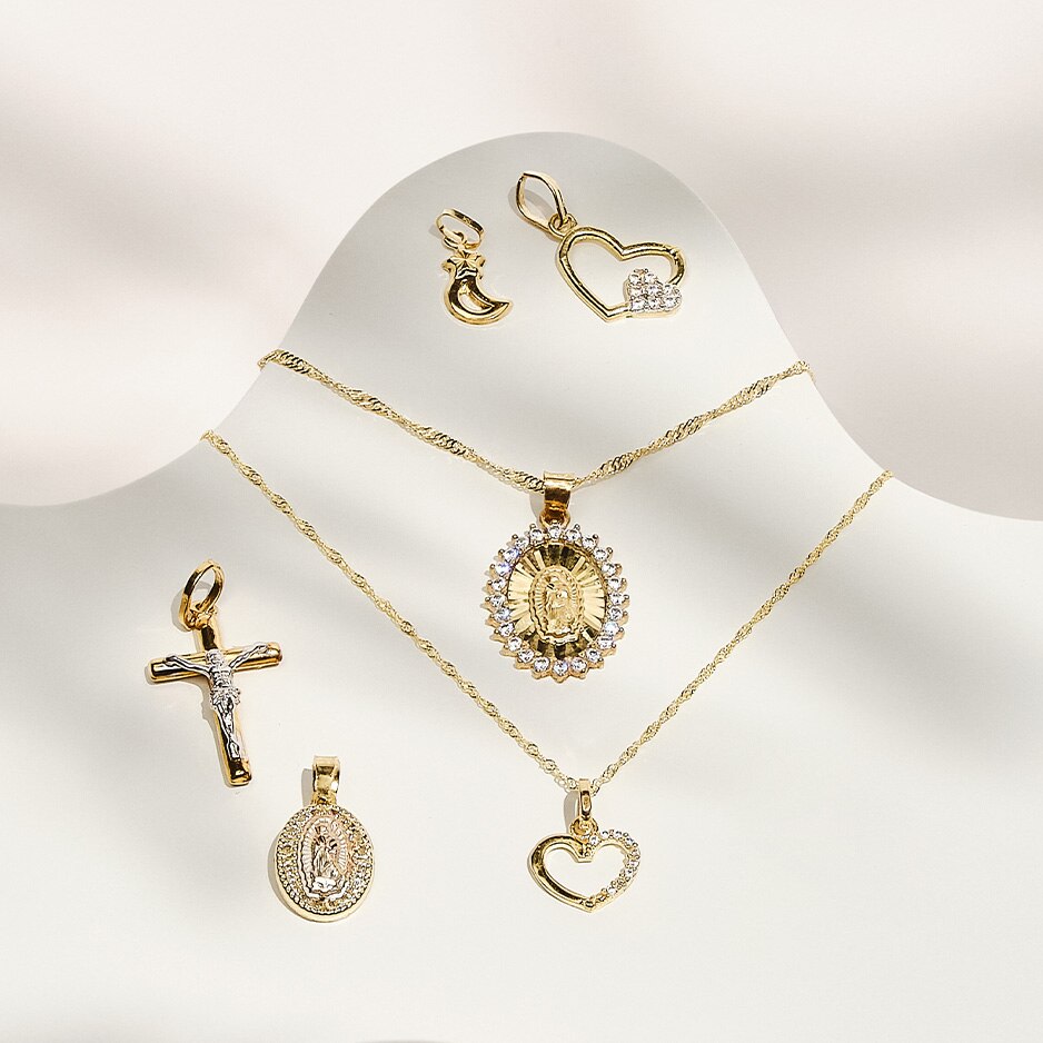 Dijes y medallas. Pulsa aquí para ver productos.